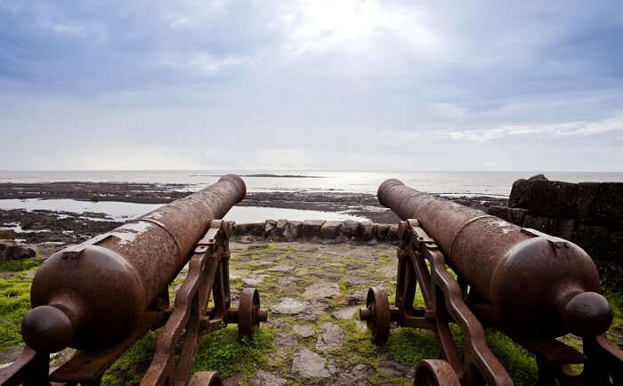 two canons facing the beach in Alibaug