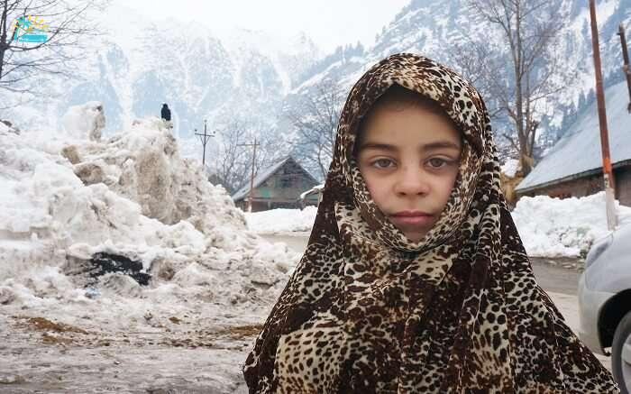 A Kashmiri girl posing for a photograph in Kashmir