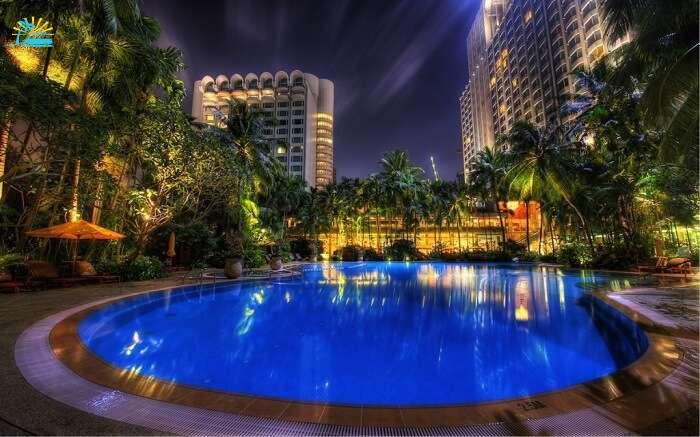 A gorgeous blue pool in a hotel