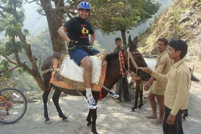 A man goes for horse riding at Chakrata