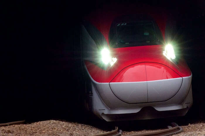 A snap of the Shinkansen bullet train exiting a tunnel
