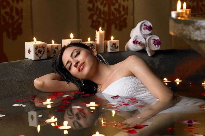 A woman enjoys an Ayurvedic treatment at the Maya Spa in Zuri Hotel