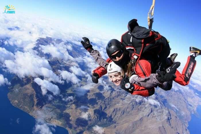 Adventurers during a skydiving session in Queenstown in New Zealand