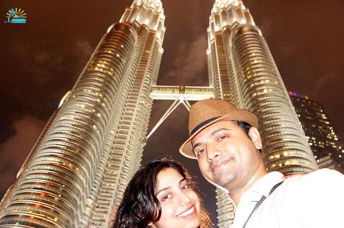 Bhargav and his wife click a selfie near Petronas Towers Malaysia