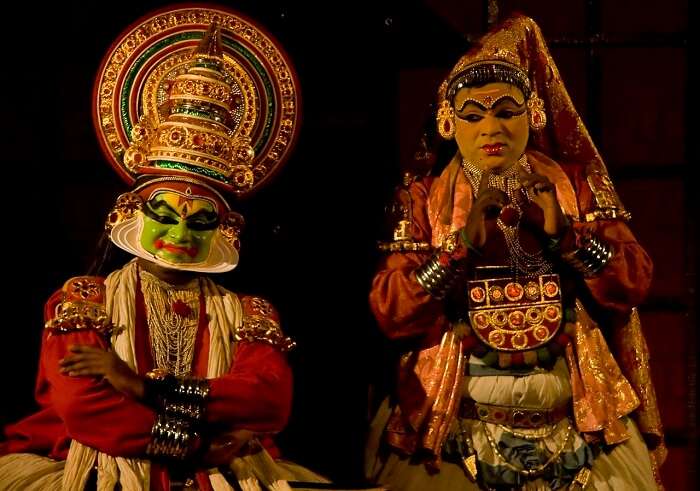 Kathakali performers on a stage in Kumarakom