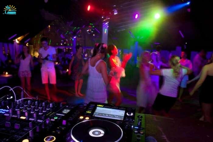People dancing at a white night party