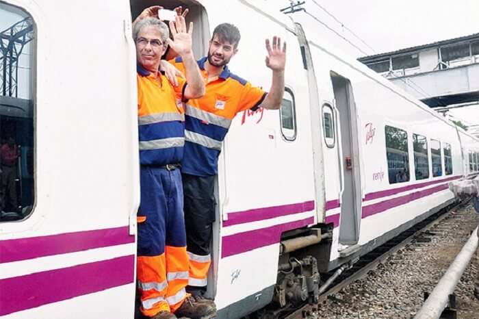 Pilots of Spanish train Talgo wave on their arrival at Moradabad Railway Station during the first trial run of the train between Bareilly and Moradabd