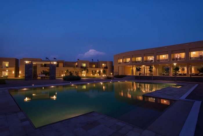 Pool and the rooms at Dera Masuda - a popular resort in Pushkar