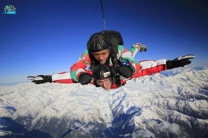 Skydiver enjoying diving session in the Franz Josef region in New Zealand