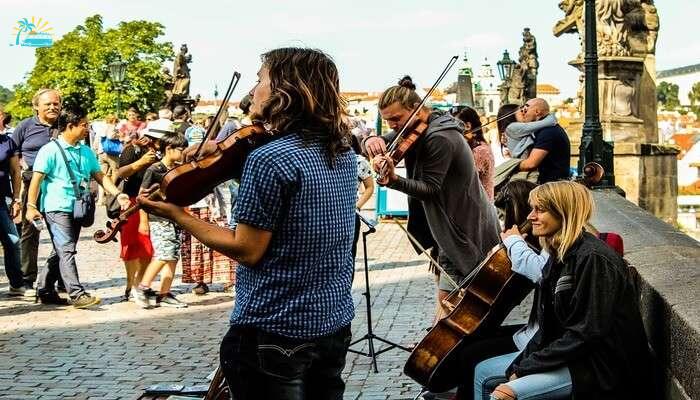 Spot the artists & musicians on the Charles Bridge