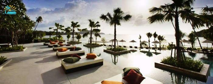 The picturesque poolside views of Radisson Blu Plaza in Phuket during sunset