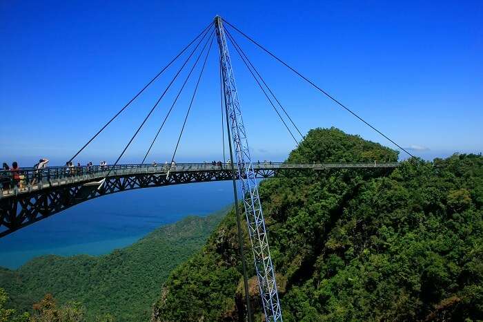 Tourists take a walk on the Langkawi Sky Bridge that overlooks the islets of Langkawi