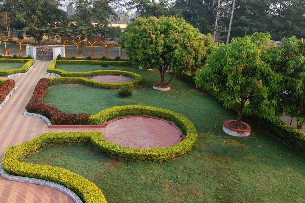 a beautifully manicured garden in a resort