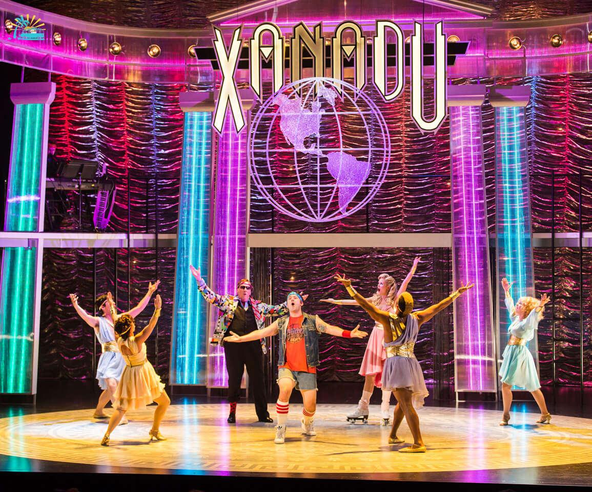 artists performing on the stage of Xanadu