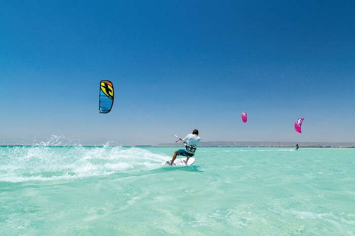 person trying kite surfing