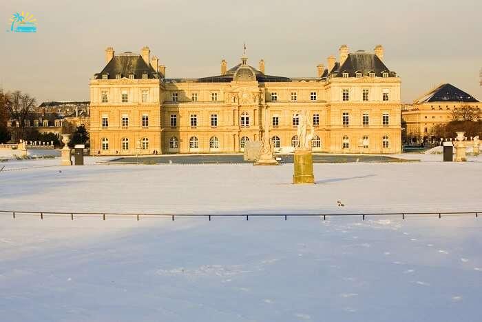play in snow at the Luxembourg Gardens in paris in winter